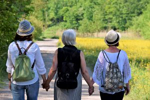 Women walking having had Menopause Consultation from The Woman's Place.